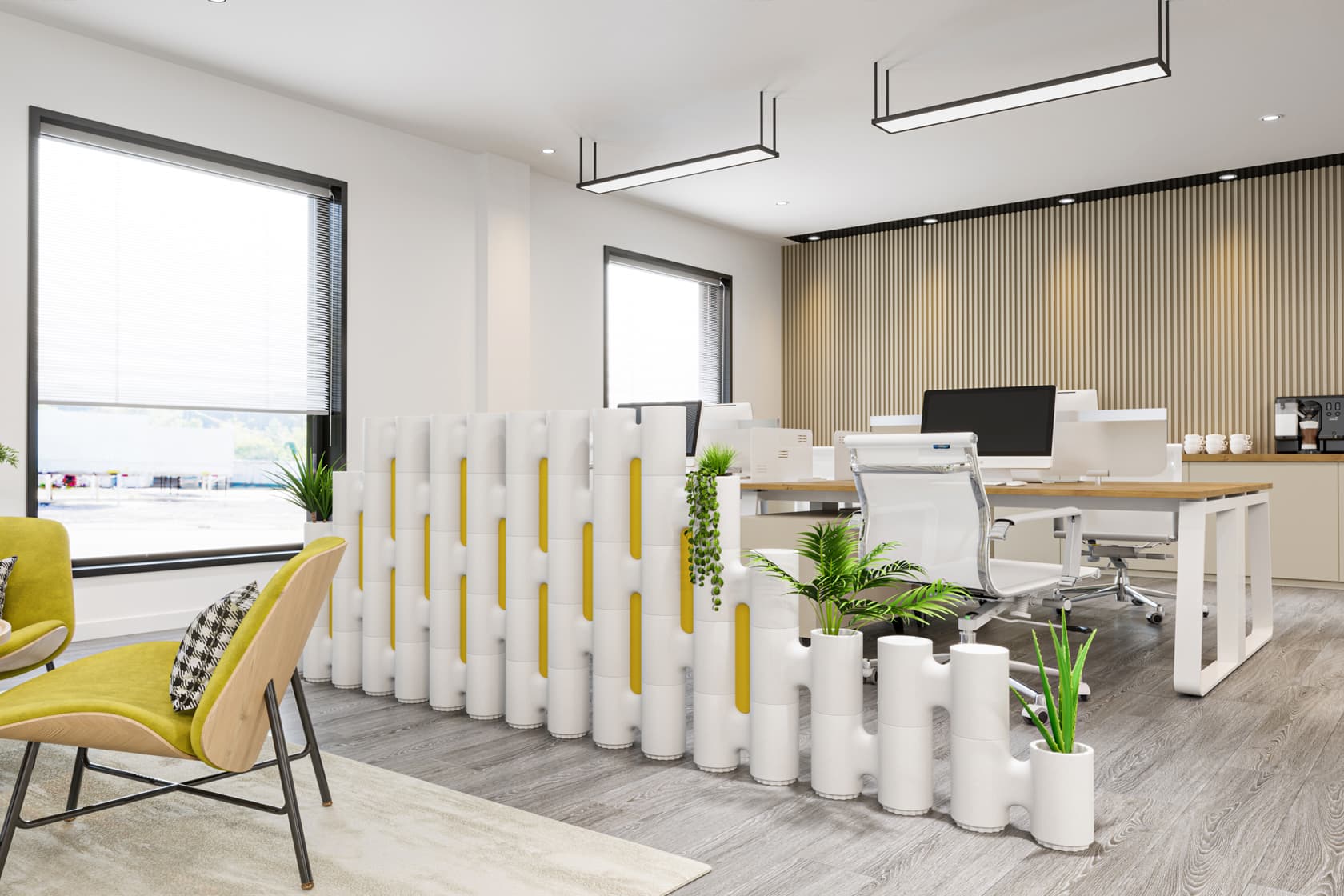 Modular office partition with plants and yellow accents separating a meeting area from workstations