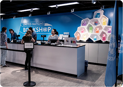 White BUILD modular retail shelving in the United Nations Bookshop in New York