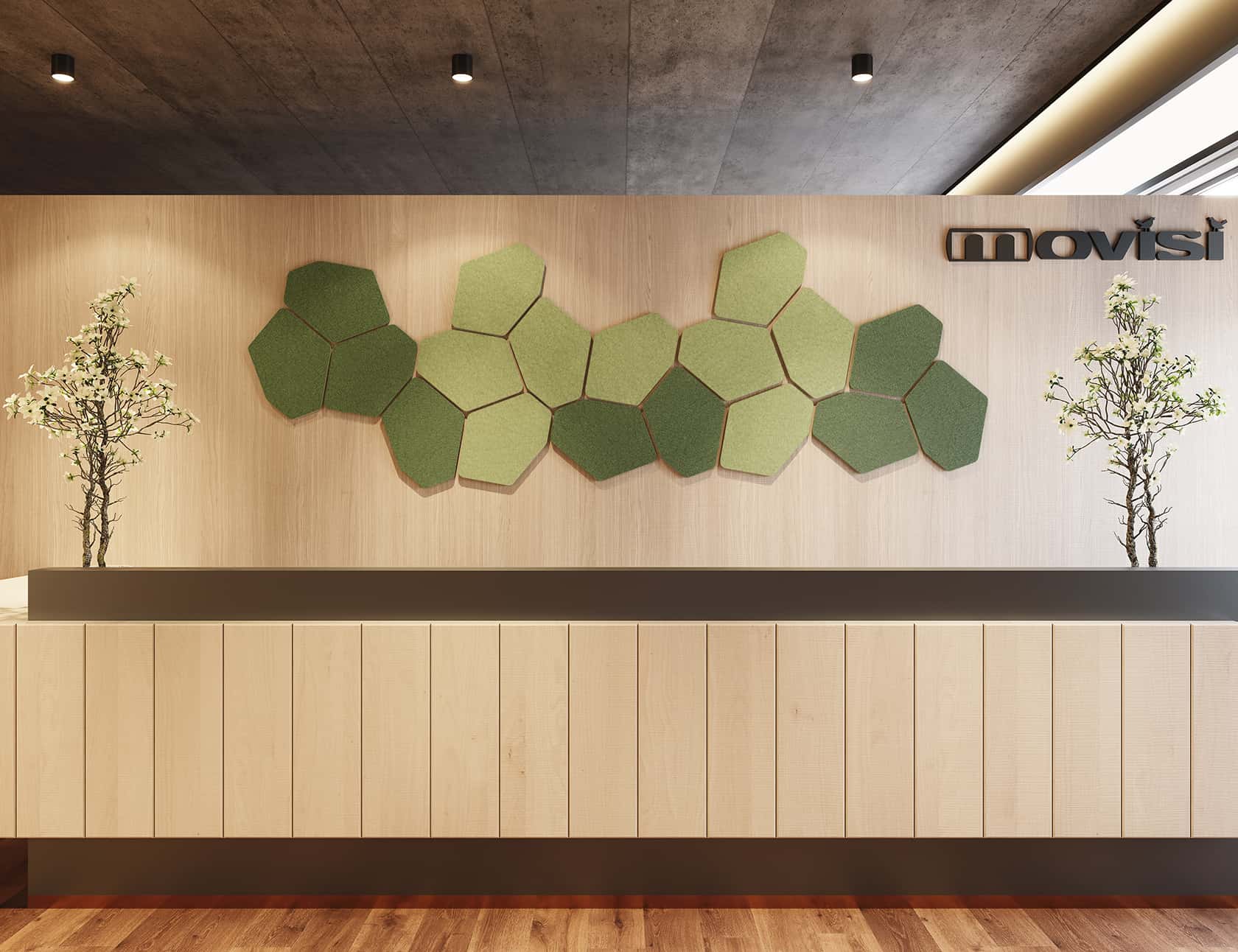 Green acoustic wall panels behind a reception desk