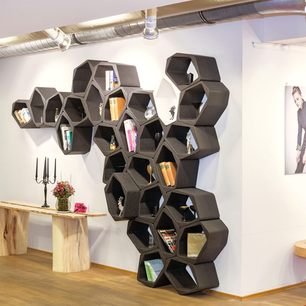 BUILD modular shelving system used as room divider in an open-plan office