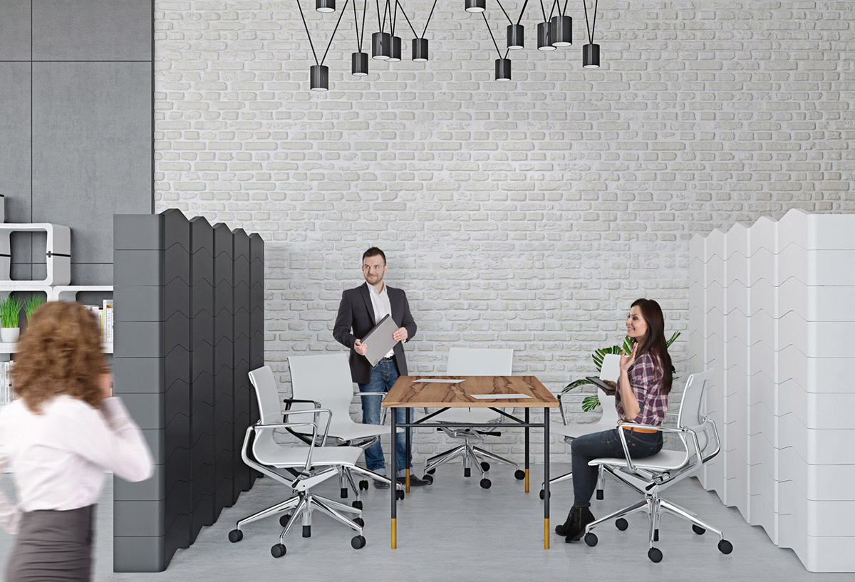 Black and white U-CUBE office screen made from 61 modules around a meeting table