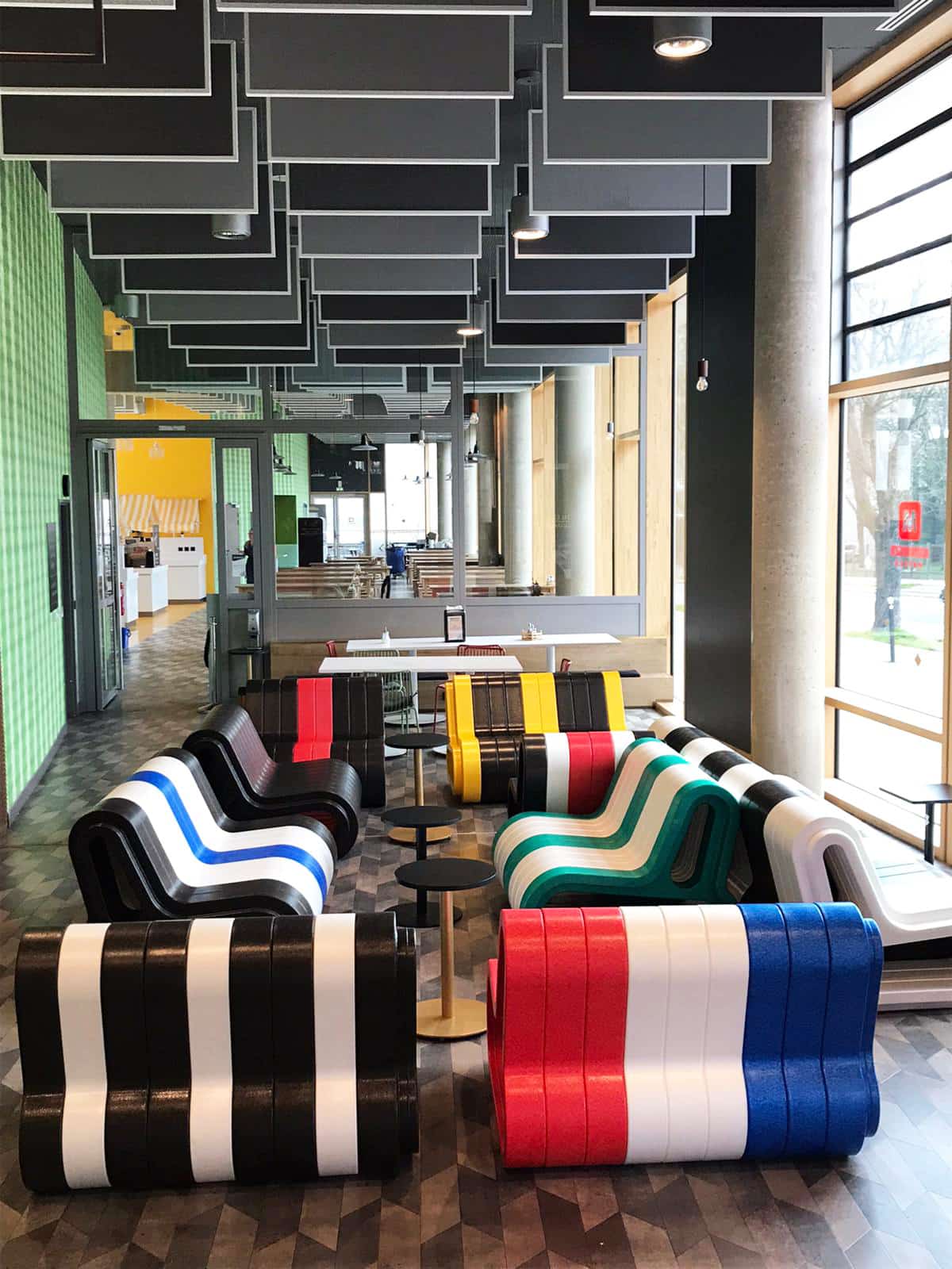 Long colourful Q-COUCH sofas in the lobby of the Meininger Hotel in Paris