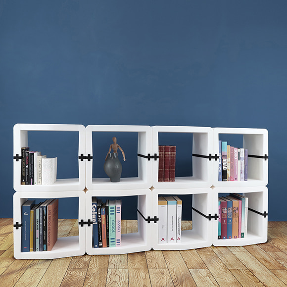 White U-CUBE sideboard of 32 modules with books