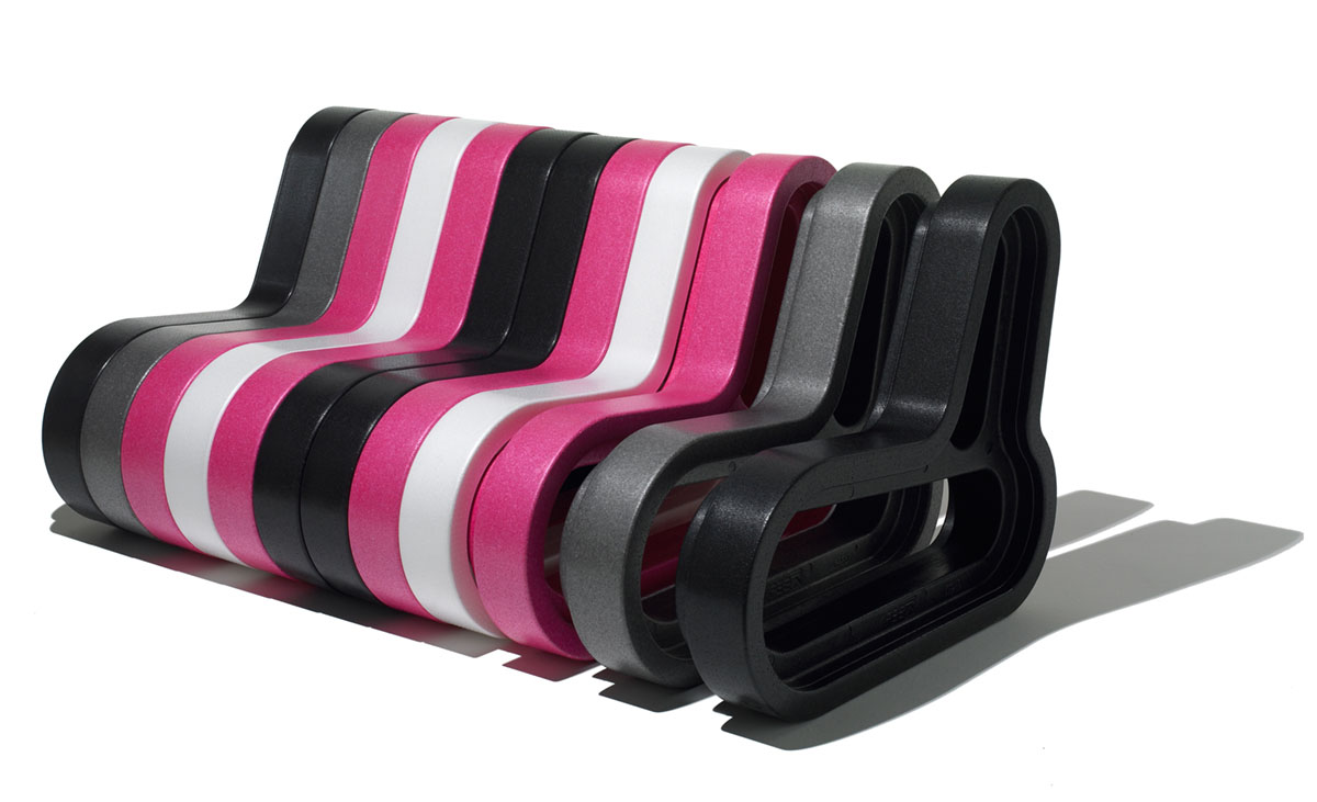 Q-COUCH sofa extended with additional black, grey and pink modules