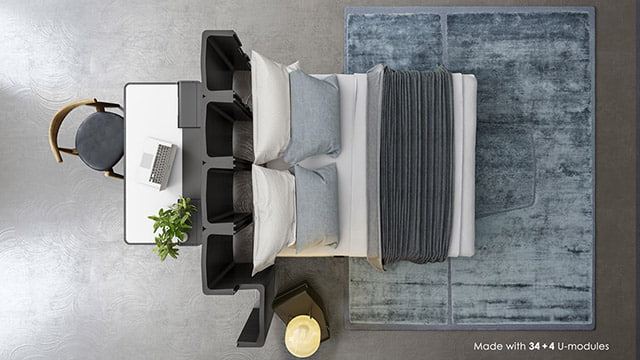 Black U-CUBE room divider wall in a bedroom